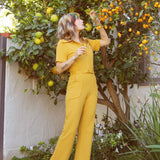 The California Shake Jumpsuit in Mustard - size: L